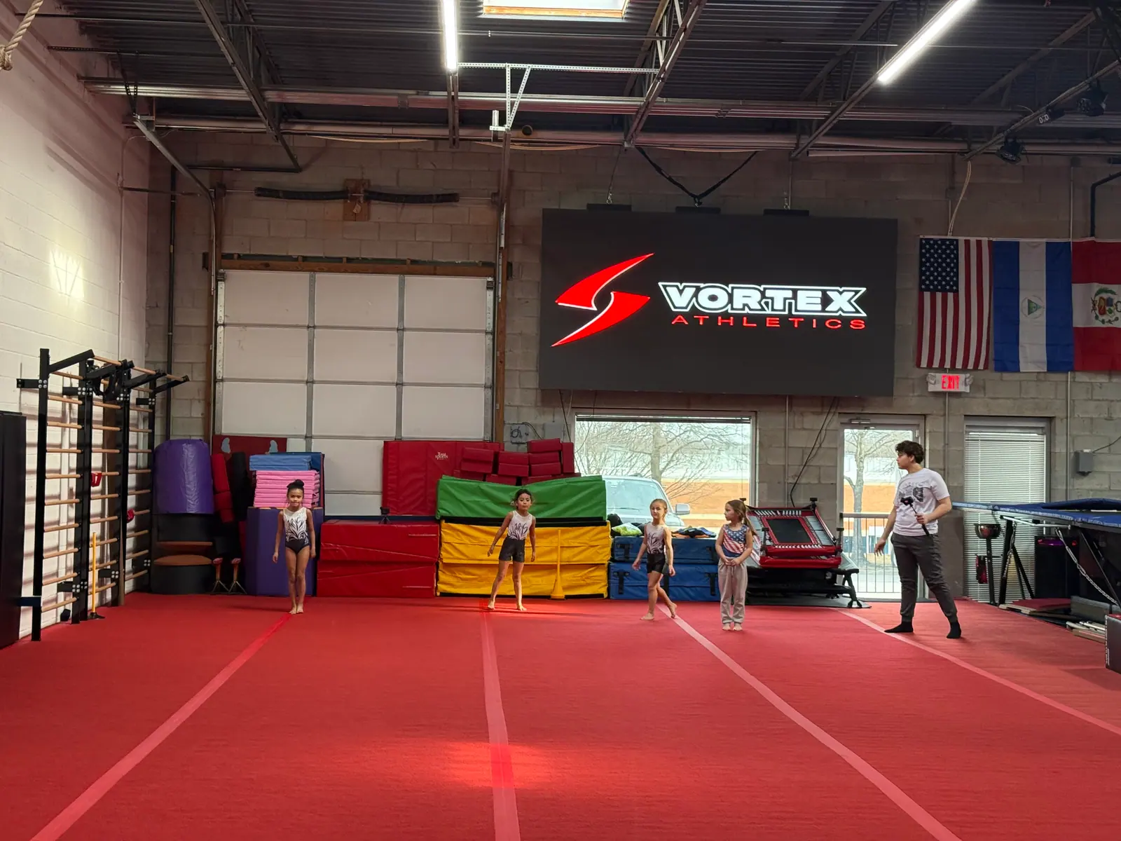 Artistic gymnastics athlete practicing strength and form